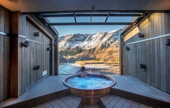 Woman relaxing in Onsen Hot Pools in Winter