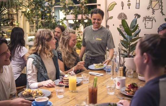 Group of friends enjoying breakfast at Yonder Café.