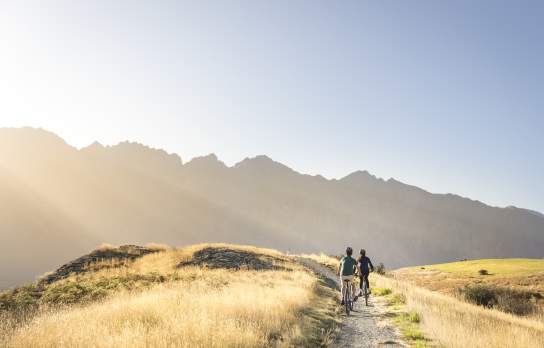 Couple Biking Along Jack's Point Trail