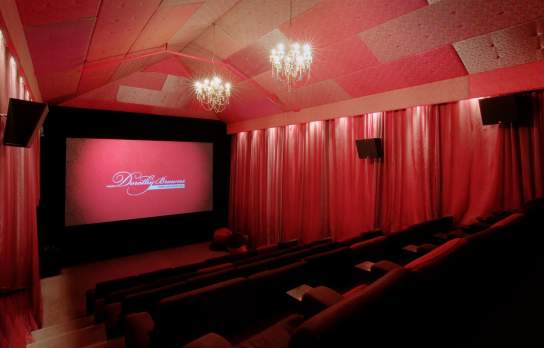 Inside Dorothy Browns Cinema with lush red interior and large comfortable seats, Arrowtown