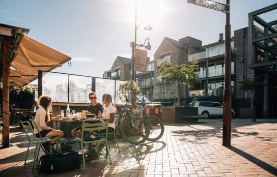 People enjoying a beer at after biking World Bar