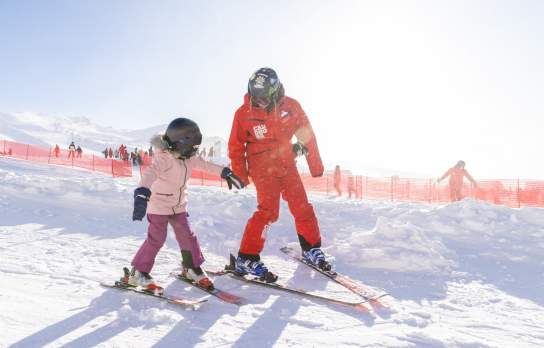 Cardrona Ski Instructor with a child during a lesson