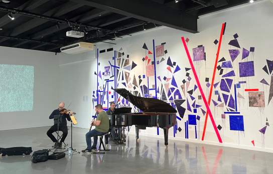 Musicians playing at Lyric and Lines Exhibition Te Atamira