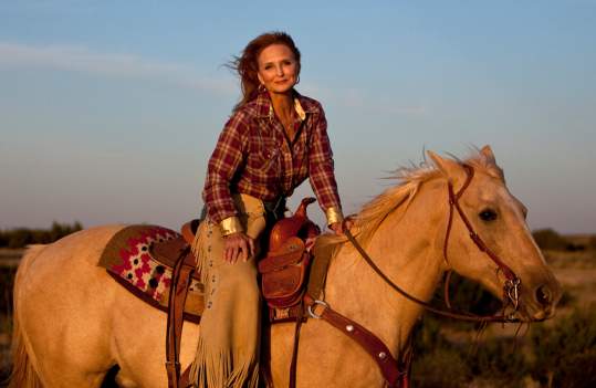 Woman riding horseback