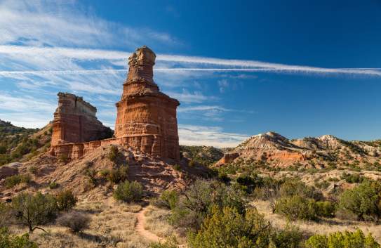 photo looking up at the lighthouse rock formation in palo duro canyon in the afternoon