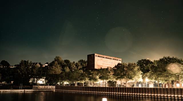 Burlington shining at night in the glow of street lamps
