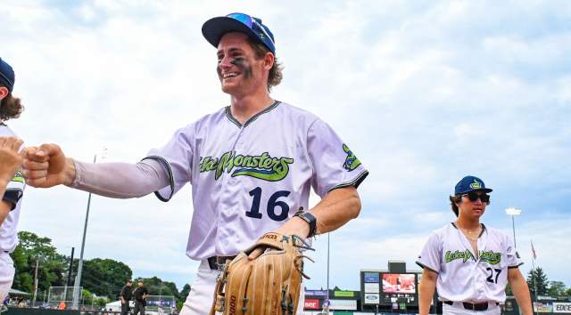Vermont Lake Monsters playing shaking hands with teammate