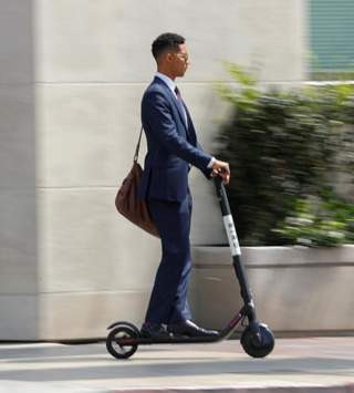 Scootin' Past The Morning Rush to Work