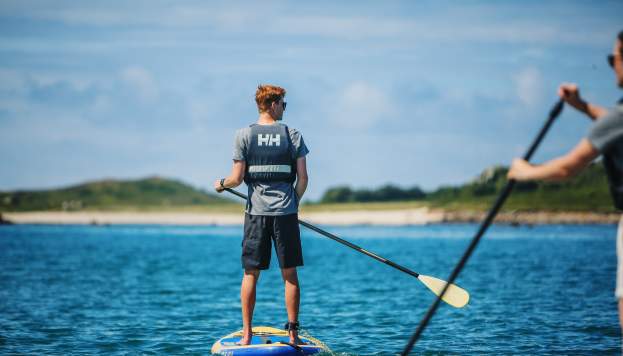 Paddleboarding teenagers