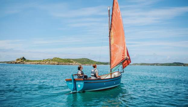 Family sailing around the islands