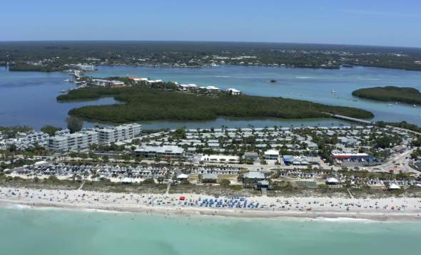 Aerial (drone) shot of Englewood Beach - Wide - from ocean looking towards land