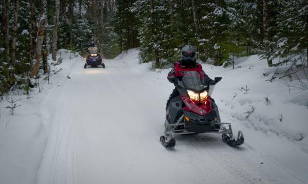snowmobilers on the trail