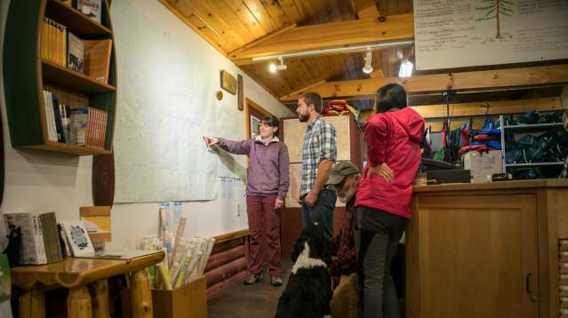 Person pointing to a map