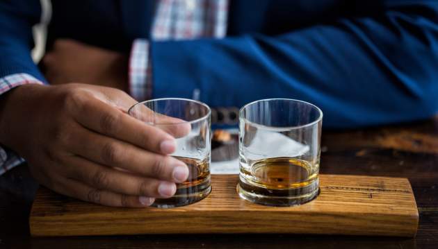 Two glasses of bourbon.