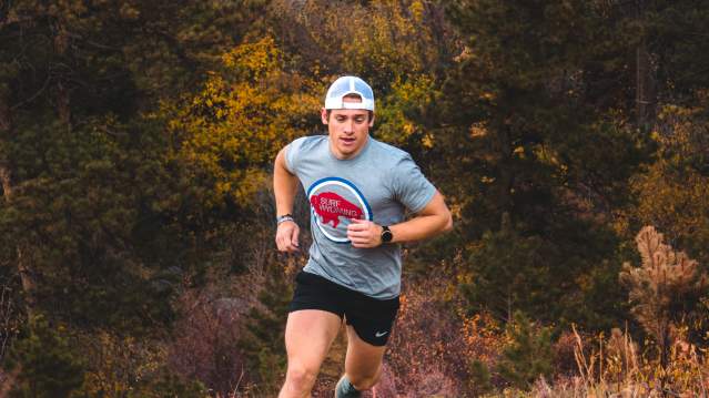 David Kerr trail running on the bridle trail on casper mountain