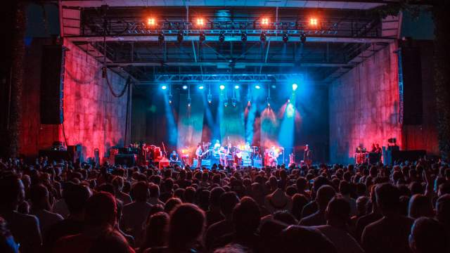 view of performers on stage from crowd
