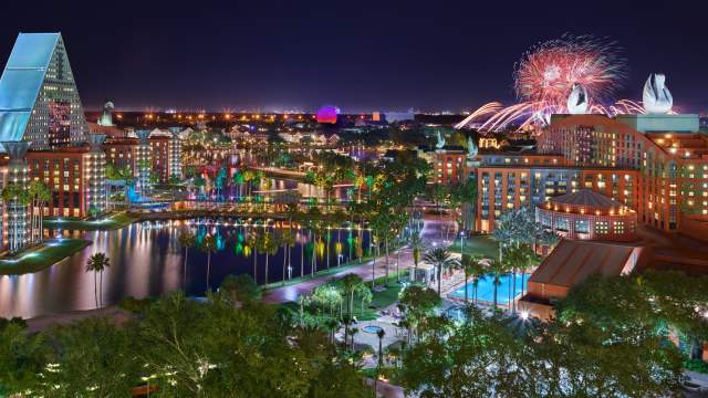 Night resort overview with fireworks of Walt Disney World Swan and Dolphin Resort