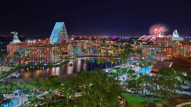 Night resort overview with fireworks of Walt Disney World Swan and Dolphin Resort