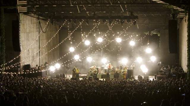 view of performers on stage from crowd