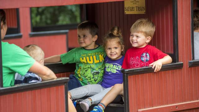A family on the train at the Milwaukee County Zoo