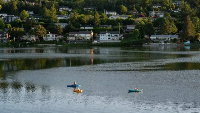 People kayaking on the water.