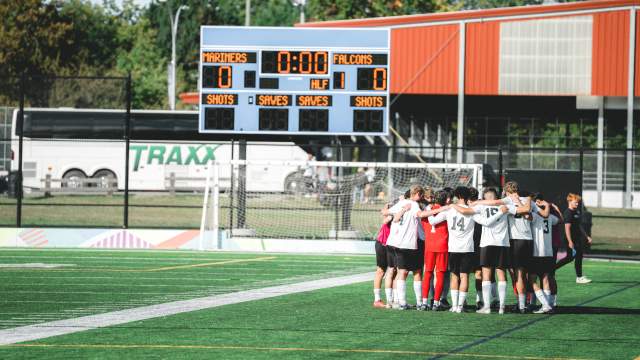 A soccer team huddle.