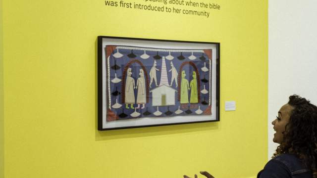 A person viewing art.