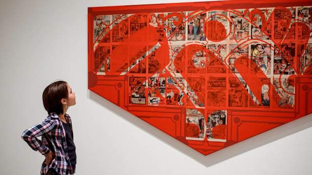 A person looking at art.