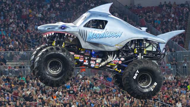Megalodon from Monster Jam soaring over a crowd