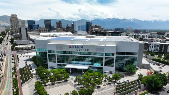 West entry of the Delta Center showing a skyline view in downtown Salt Lake City