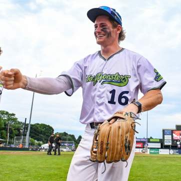 Vermont Lake Monsters playing shaking hands with teammate