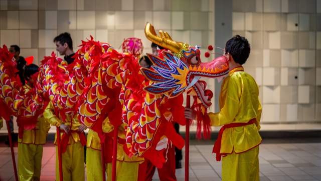 Kids holding a Chinese dragon