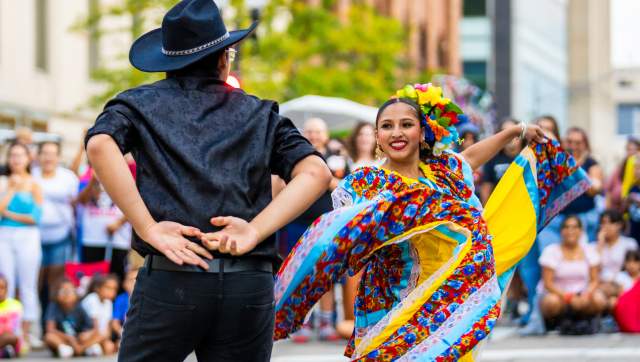 Dancers in the street with colorful clothes