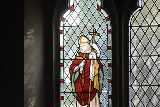A stained glass window of Stephen Langton in a church