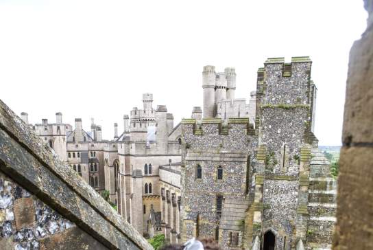 Lady walking up the stairs outside Arundel Castle