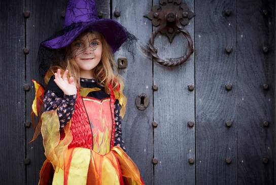 Child dressed up as a witch at Sudeley Castle in Cheltenham.