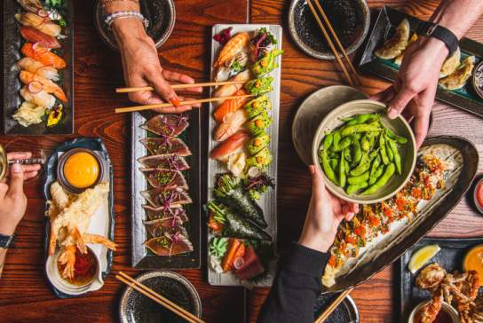 Table full of food served at KIBOU Cheltenham.