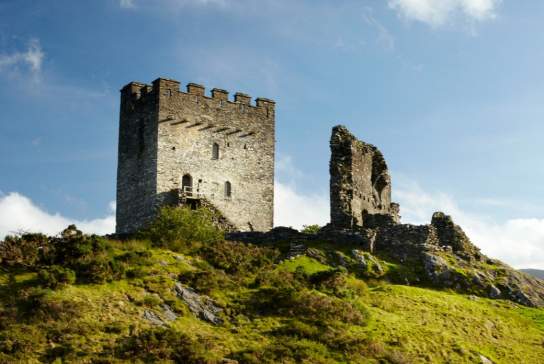 View of the remains of Dolwyddelan Castle in Conwy on top of a hill