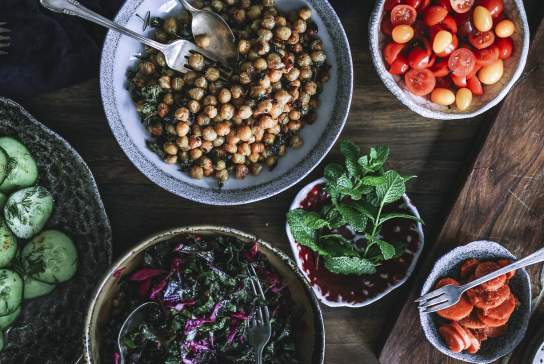 Photograph showing an array of vegetarian and vegan dishes