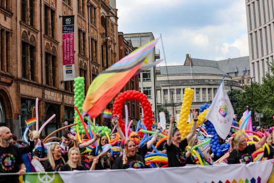 People celebrating Manchester Pride during the parade