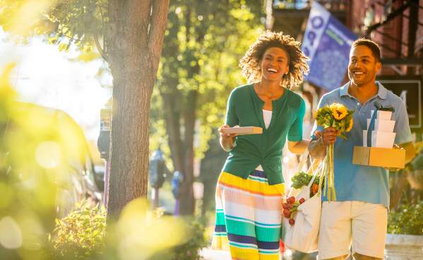 Couple walking downtown shopping