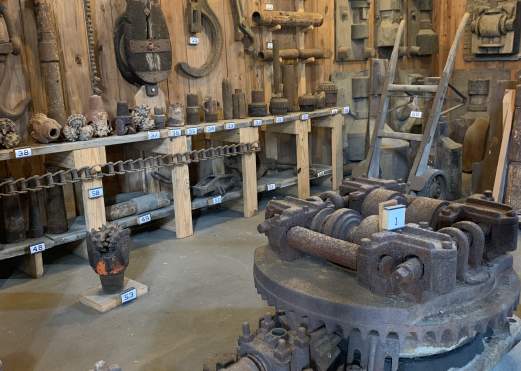 Spindletop Museum history exhibit of vintage drill bits and drilling equipment