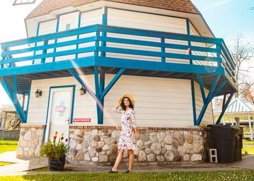 Woman outside the Dutch Windmill Museum