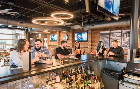 three couples at a bar