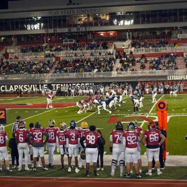 football game in a large stadium