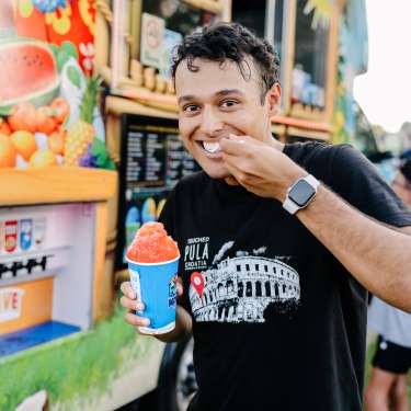 Man enjoying sno cone at Beachaven Winery