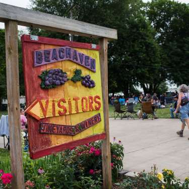 people walking in to an event at Beachaven Winery