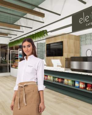 Mockup of Elevate Cafe with a woman in a barista uniform in the center