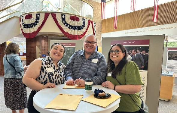 Three professional people at a CTA Networking event
