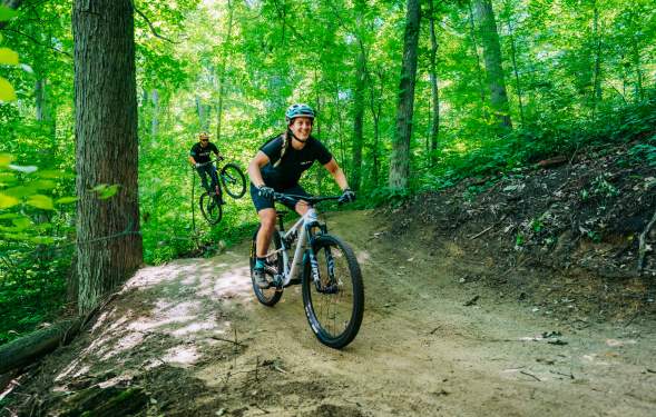Couple biking on the DTE Energy Foundation Trail